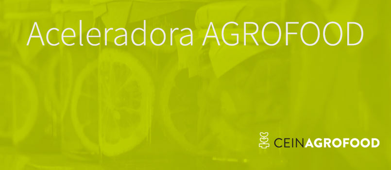 Fotografía de la frase aceleradora agrofood en blanco sobre un fondo verde