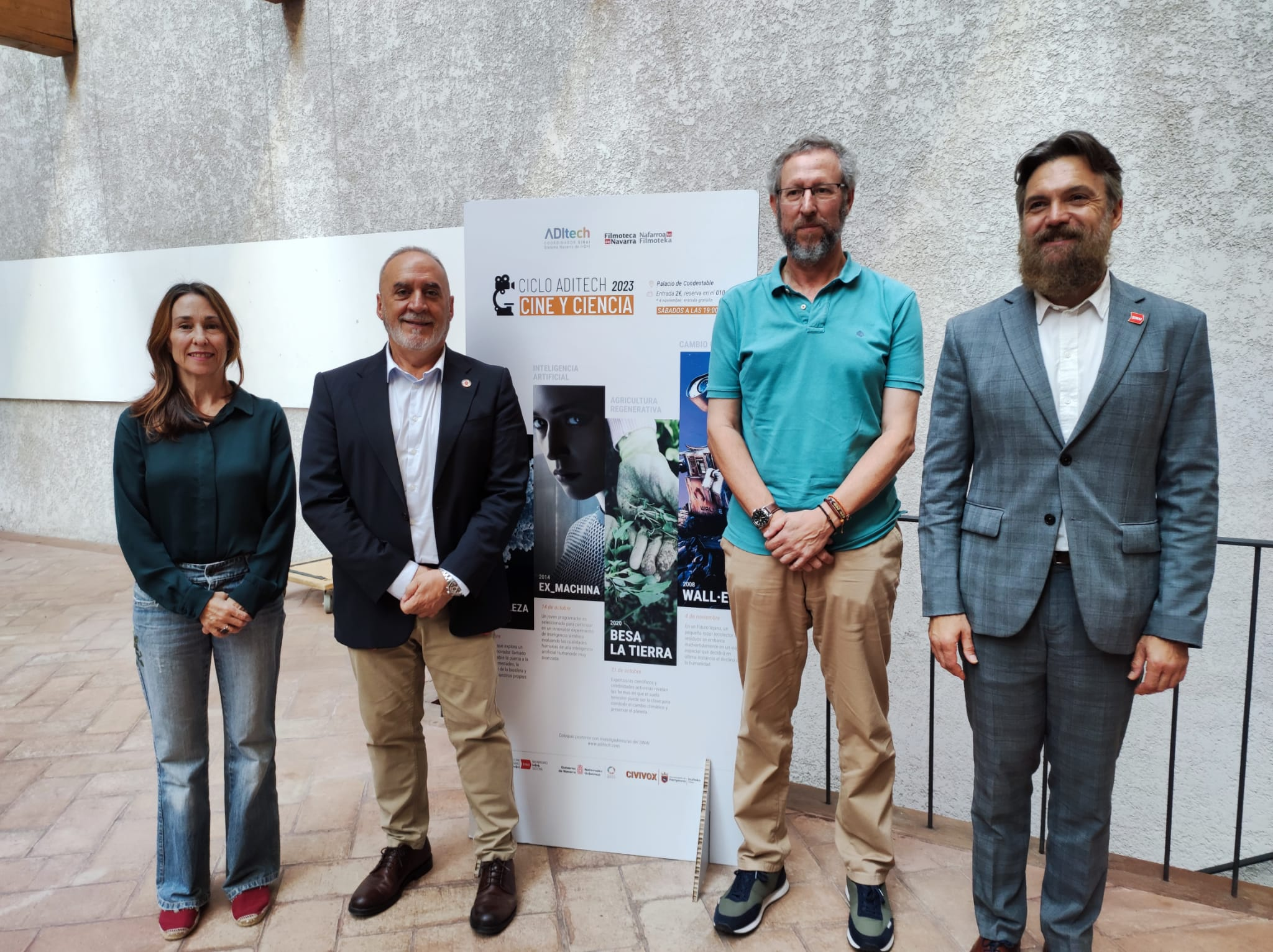 Fotografía de Arana, responsable de Excelencia y Divulgación de I+D+i en ADItech; el consejero Cigudosa; Cañada, director de la Filmoteca de Navarra (Nicdo); y Garrido, director general de ADItech, coordinador del SINAI.
