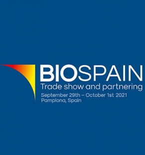 Fotografía del cartel promocional del evento con un fondo azul oscuro y la frase biospain y la fecha en la que se celebrará.