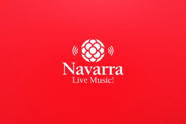 Fotografía de la frase Navarra Live Music sobre un fondo rojo